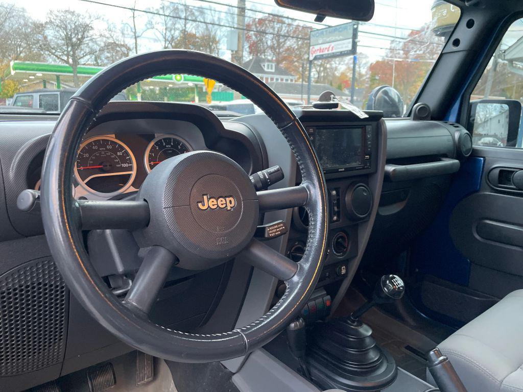 used 2009 Jeep Wrangler Unlimited car, priced at $13,995
