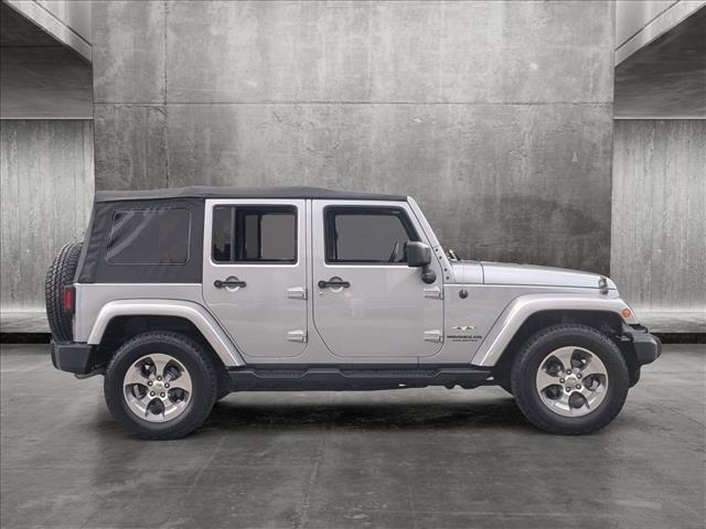 used 2016 Jeep Wrangler Unlimited car, priced at $19,469