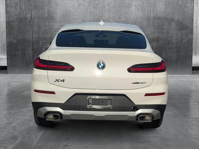 used 2025 BMW X4 car, priced at $59,675