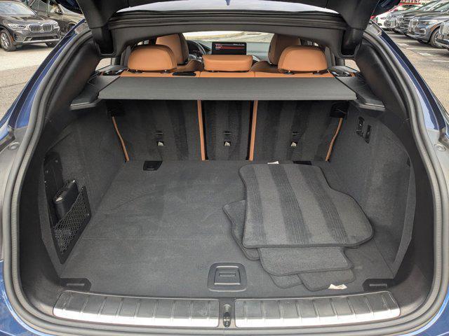 used 2025 BMW X4 car, priced at $53,488