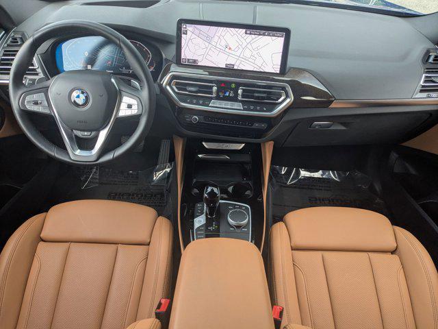 used 2025 BMW X4 car, priced at $53,488