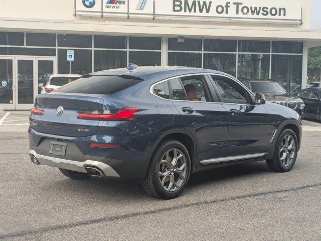 used 2025 BMW X4 car, priced at $53,488