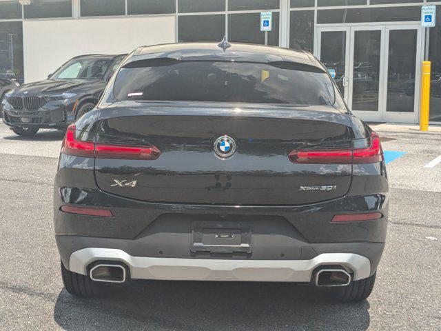 used 2025 BMW X4 car, priced at $54,988
