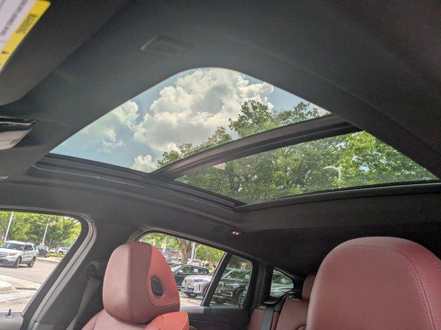 used 2025 BMW X4 car, priced at $54,988