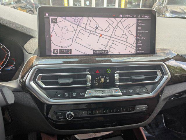 used 2025 BMW X4 car, priced at $54,988