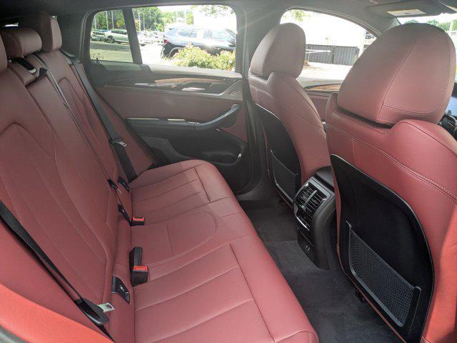 used 2025 BMW X4 car, priced at $54,988