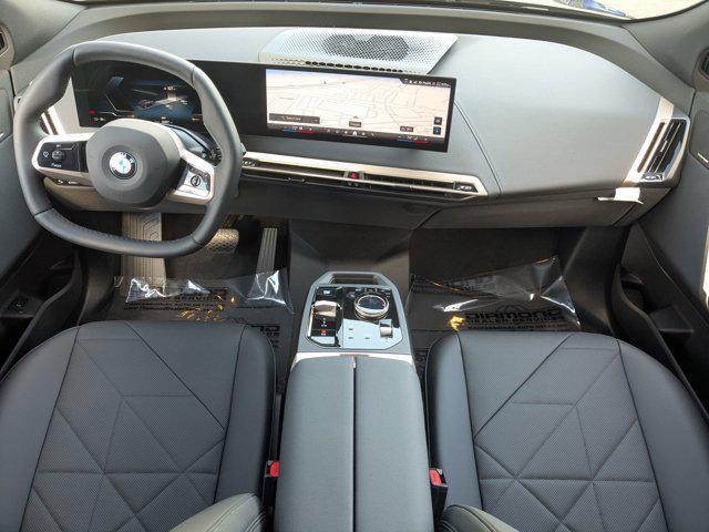 new 2026 BMW iX car, priced at $92,725