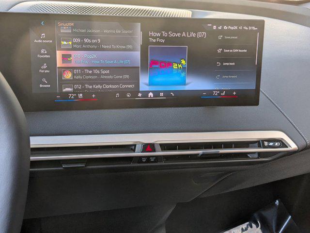 new 2026 BMW iX car, priced at $92,725