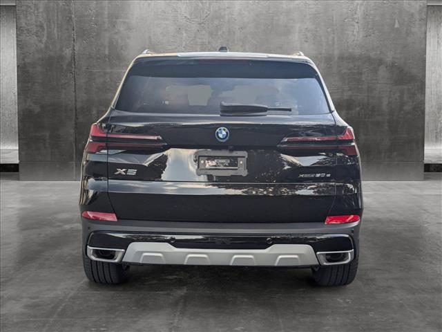 new 2025 BMW X5 PHEV car, priced at $77,875