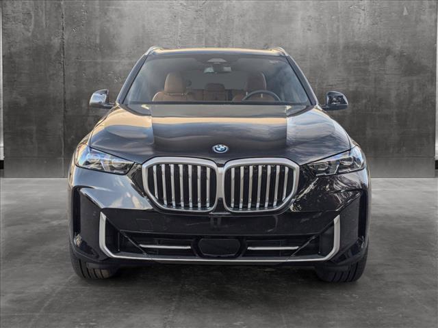 new 2025 BMW X5 PHEV car, priced at $77,875