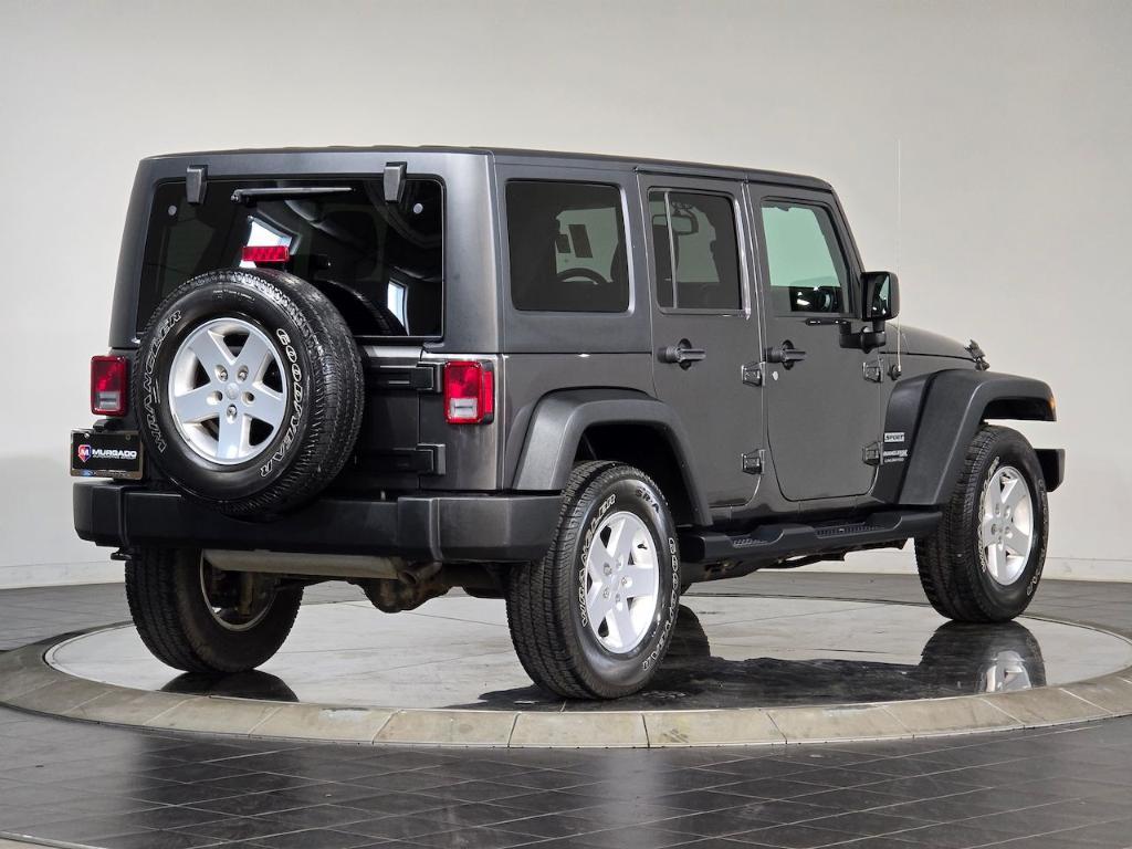 used 2018 Jeep Wrangler JK Unlimited car, priced at $23,175