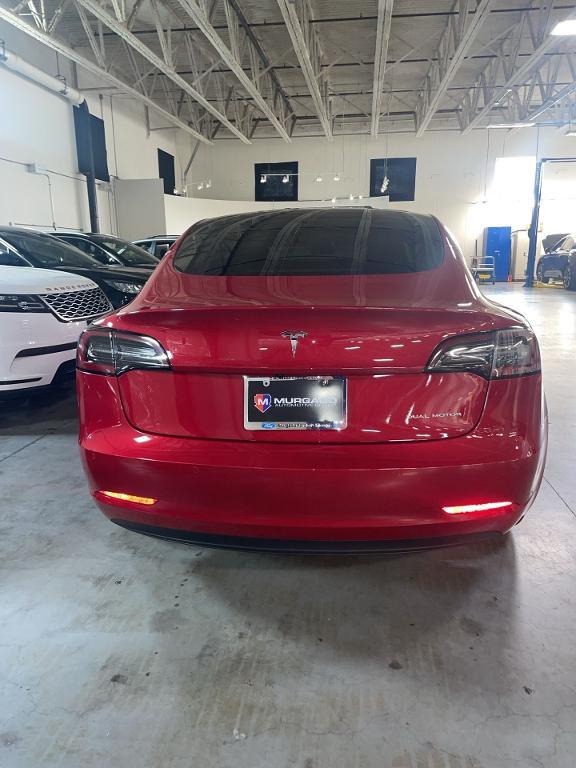 used 2022 Tesla Model 3 car, priced at $27,499