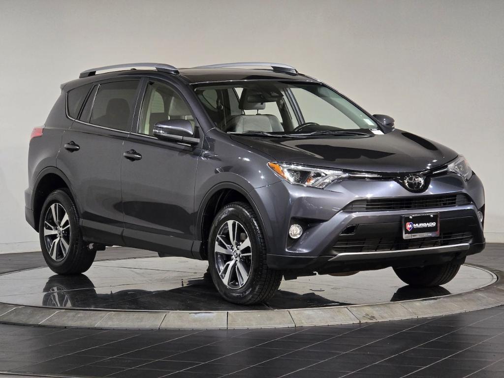 used 2018 Toyota RAV4 car, priced at $23,899