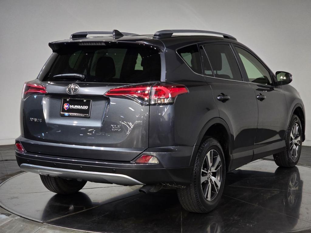 used 2018 Toyota RAV4 car, priced at $23,899