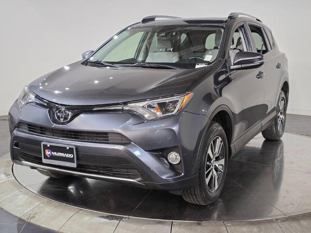 used 2018 Toyota RAV4 car, priced at $23,899