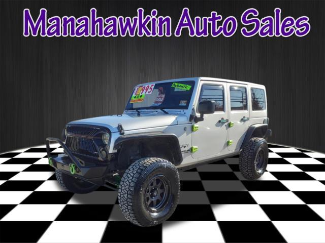 used 2012 Jeep Wrangler Unlimited car, priced at $18,995