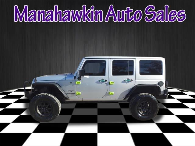 used 2012 Jeep Wrangler Unlimited car, priced at $18,995