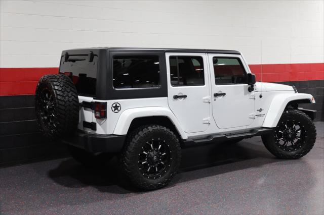 used 2015 Jeep Wrangler Unlimited car, priced at $23,788