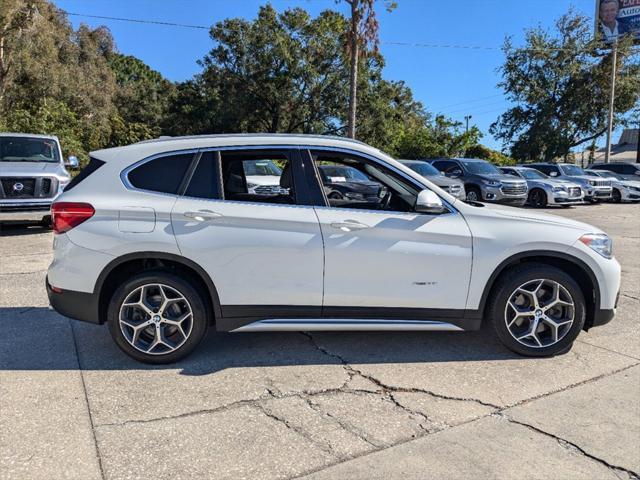 used 2018 BMW X1 car, priced at $14,000