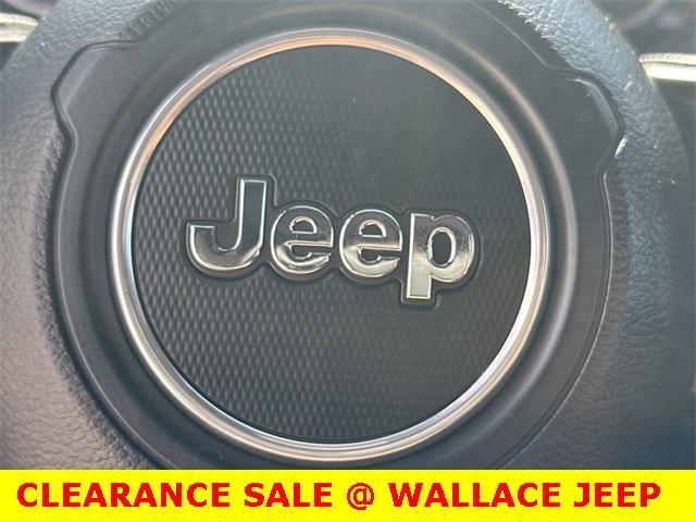 used 2023 Jeep Wrangler car, priced at $27,900