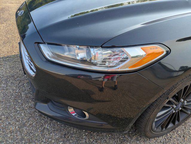 used 2014 Ford Fusion car, priced at $6,288