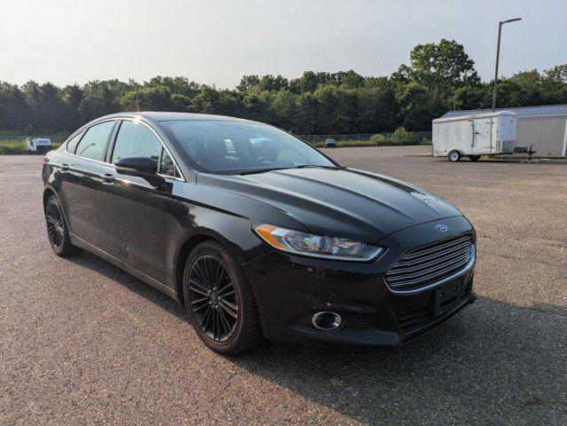 used 2014 Ford Fusion car, priced at $6,288