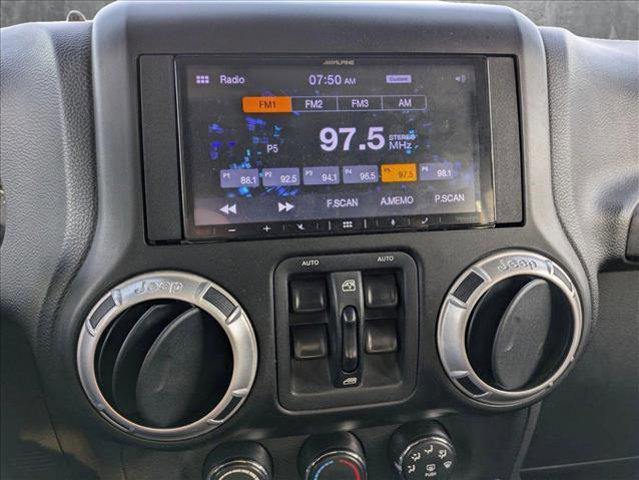 used 2014 Jeep Wrangler Unlimited car, priced at $14,991