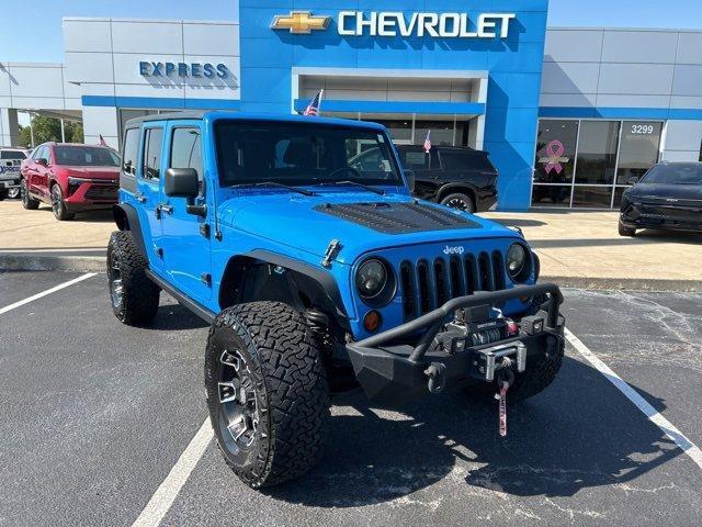 used 2012 Jeep Wrangler Unlimited car, priced at $17,990