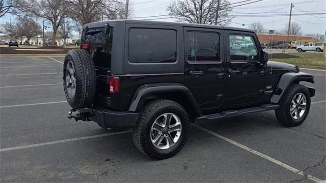 used 2018 Jeep Wrangler JK Unlimited car, priced at $23,888