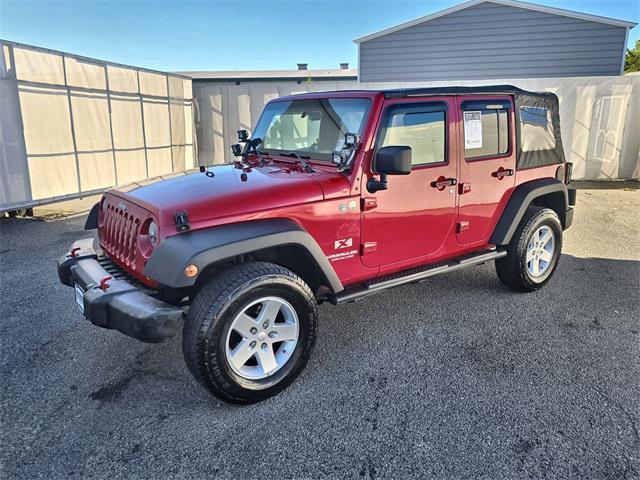 used 2009 Jeep Wrangler Unlimited car, priced at $11,988