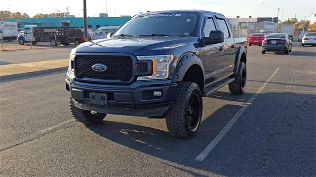 used 2018 Ford F-150 car, priced at $24,804