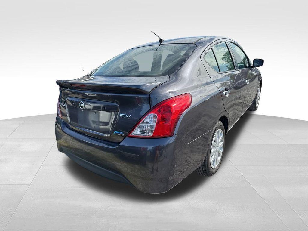 used 2015 Nissan Versa car, priced at $5,400