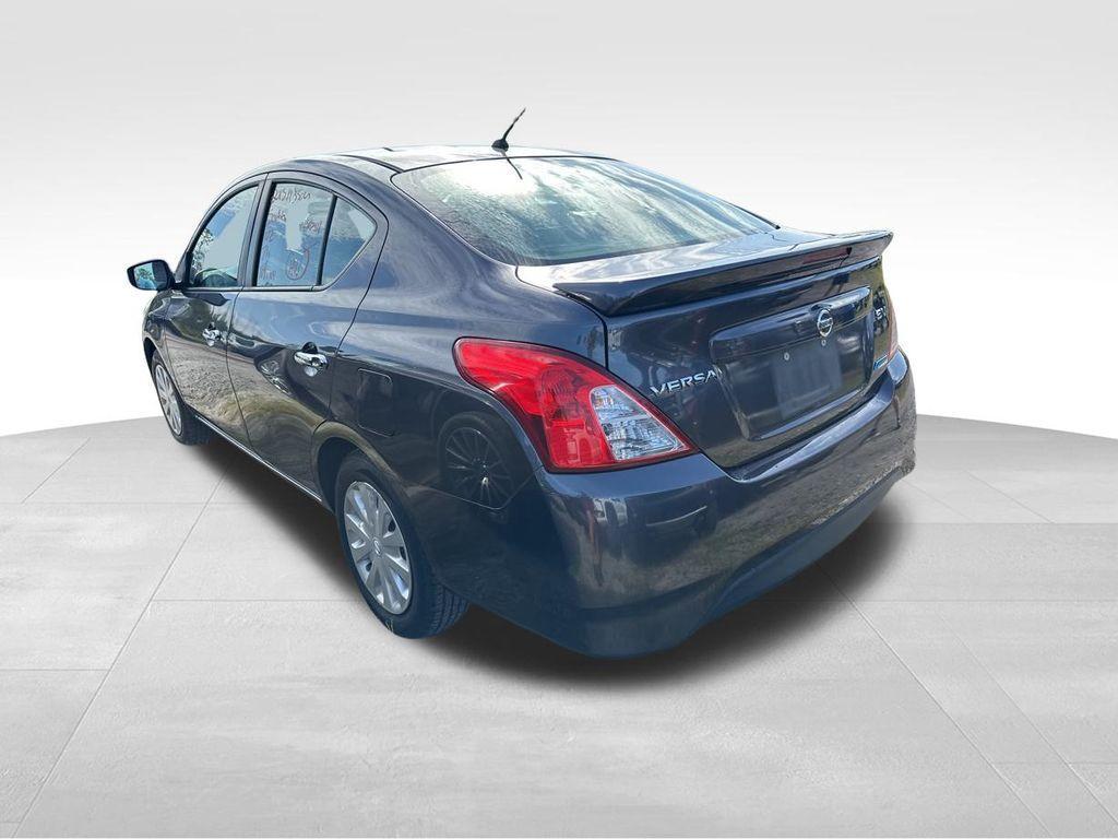 used 2015 Nissan Versa car, priced at $5,400