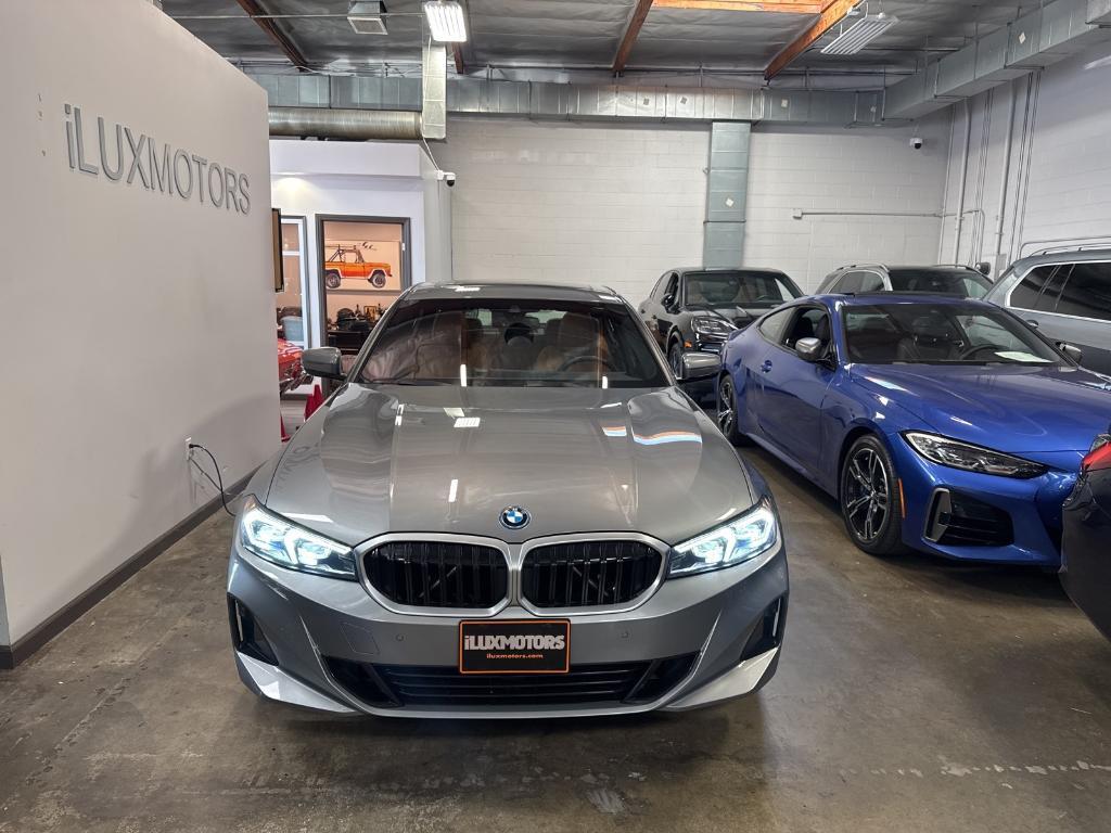 used 2023 BMW 330e car, priced at $31,333