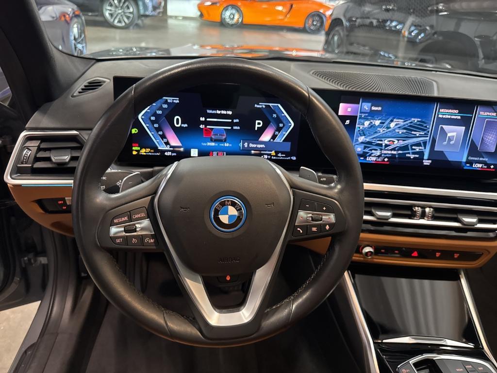 used 2023 BMW 330e car, priced at $31,333