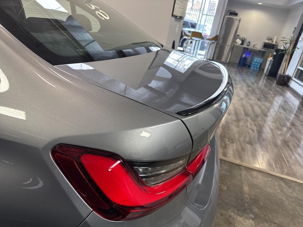 used 2024 BMW 330e car, priced at $37,888