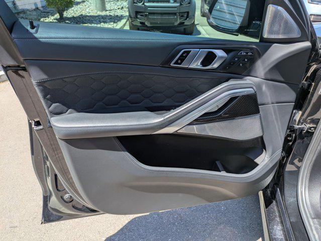 used 2023 BMW X6 M car, priced at $87,302