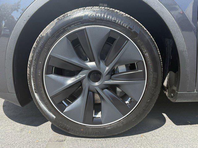 used 2024 Tesla Model Y car, priced at $34,929