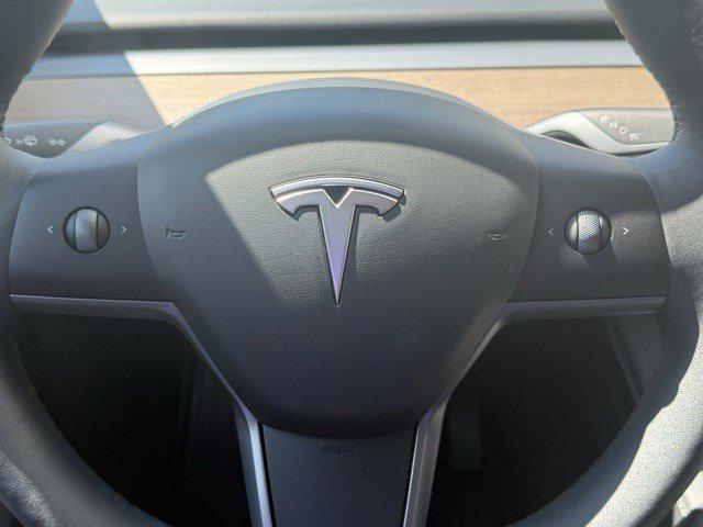 used 2024 Tesla Model Y car, priced at $34,929