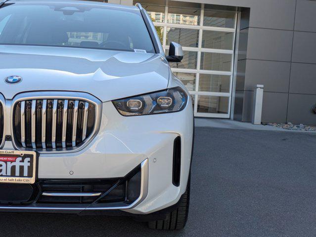 used 2024 BMW X5 car, priced at $58,142