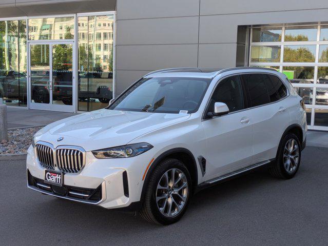 used 2024 BMW X5 car, priced at $58,142