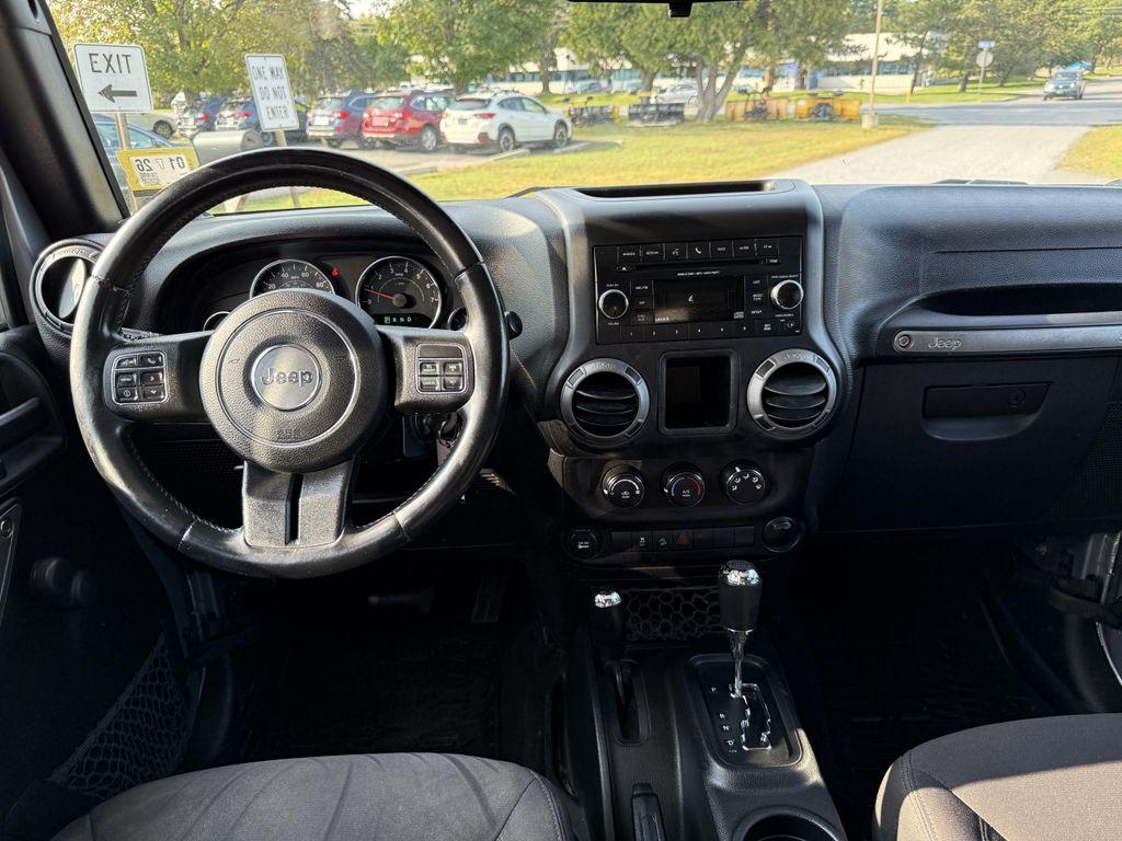 used 2015 Jeep Wrangler Unlimited car, priced at $14,895