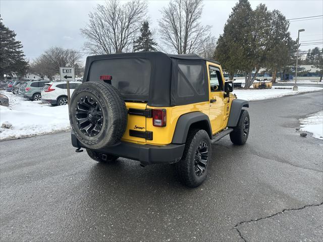 used 2015 Jeep Wrangler car, priced at $13,995