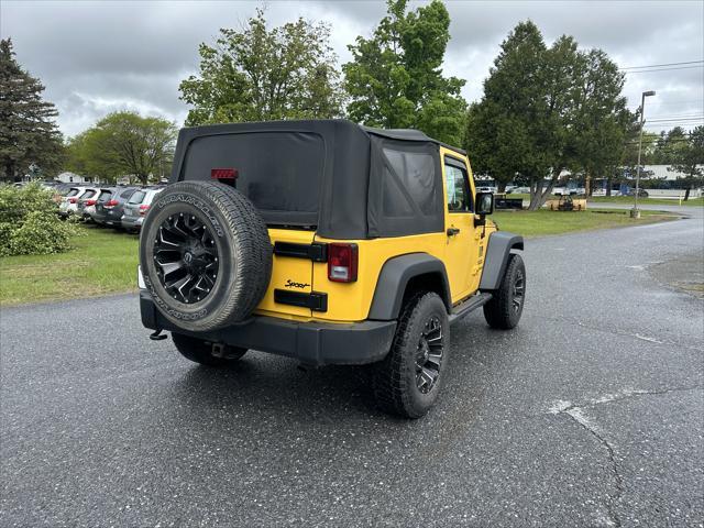 used 2015 Jeep Wrangler car, priced at $13,895