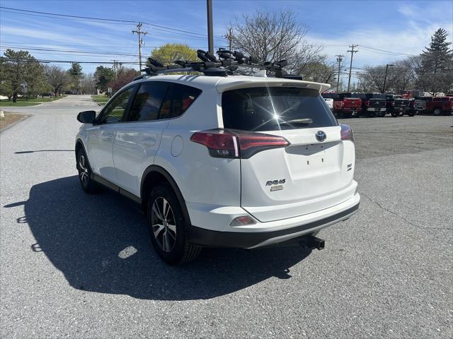 used 2018 Toyota RAV4 car, priced at $14,995