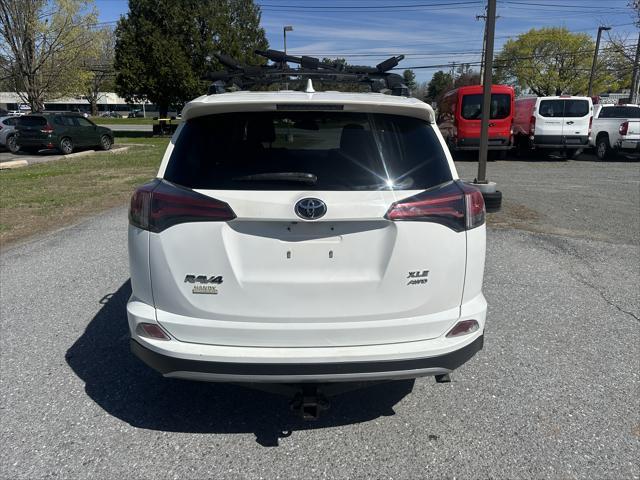 used 2018 Toyota RAV4 car, priced at $14,995