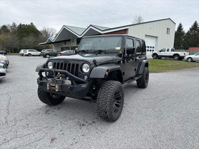 used 2014 Jeep Wrangler Unlimited car, priced at $17,695
