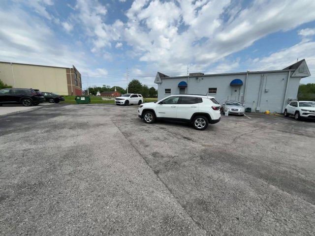 used 2023 Jeep Compass car, priced at $21,199