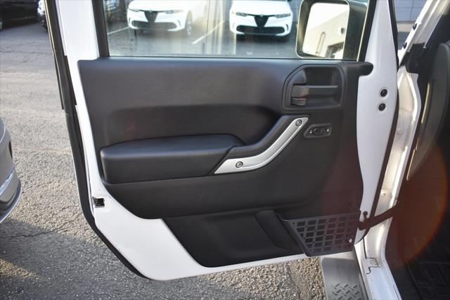 used 2016 Jeep Wrangler Unlimited car, priced at $19,299