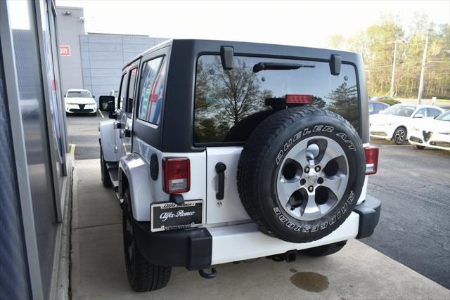 used 2016 Jeep Wrangler Unlimited car, priced at $19,299